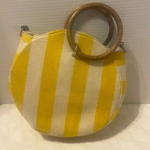 Adorable yellow and white stripe handbag. Wooden handles.